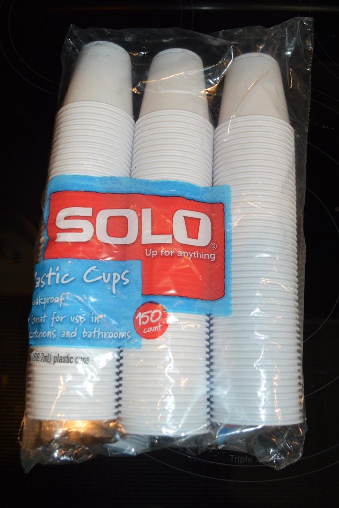 For large quantities of pots that are inexpensive enough to be used for a single seedling, plus can be easily marked for tracking purposes, Solo bathroom cups have yet to be beaten.